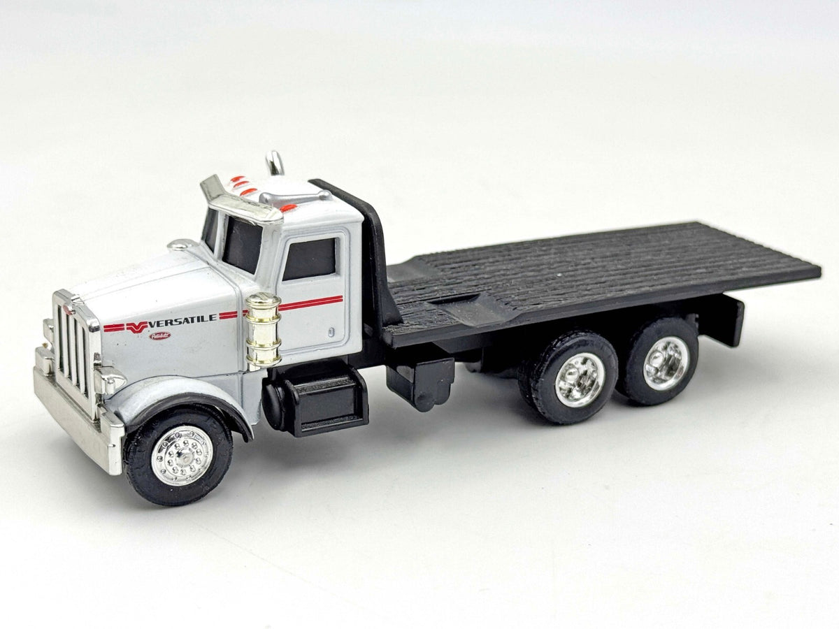 1/64 Peterbilt Model 367 Versatile Dealer Flatbed Truck