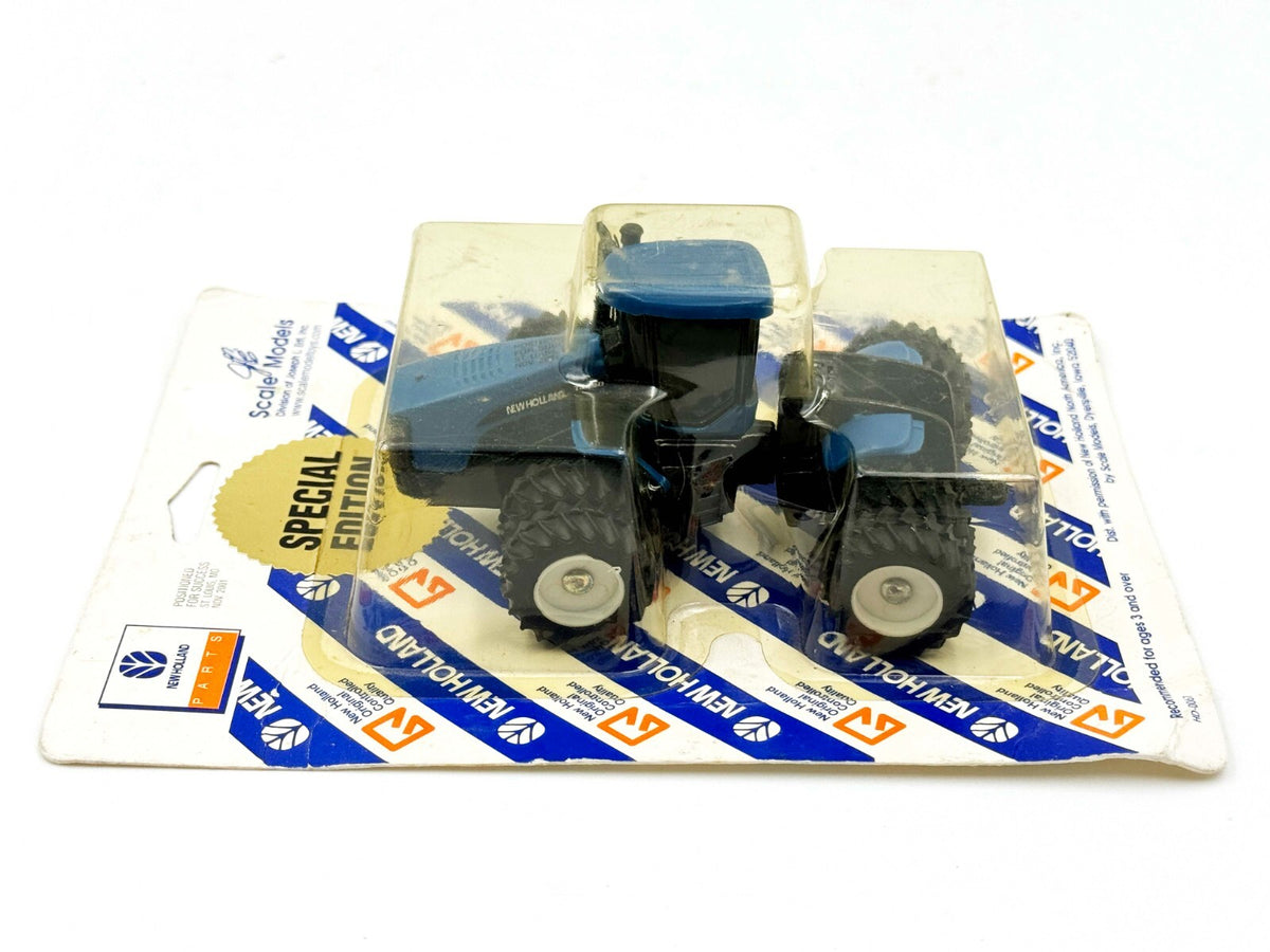 1/64 New Holland TJ450 Tractor with 4WD and Flotation Duals Special Edition Posi