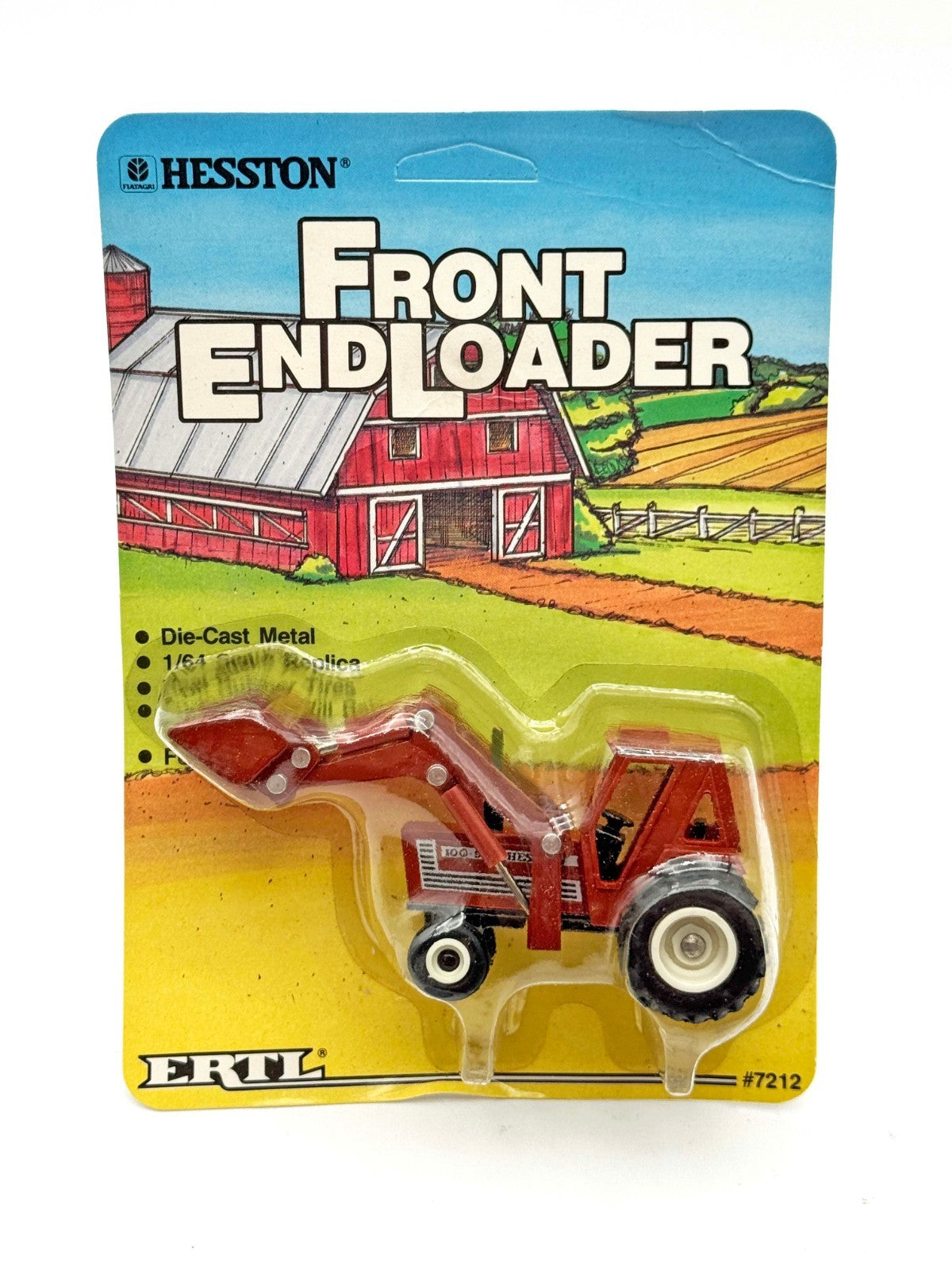 1/64 Hesston 100-90 Tractor With Loader Rubber Tires