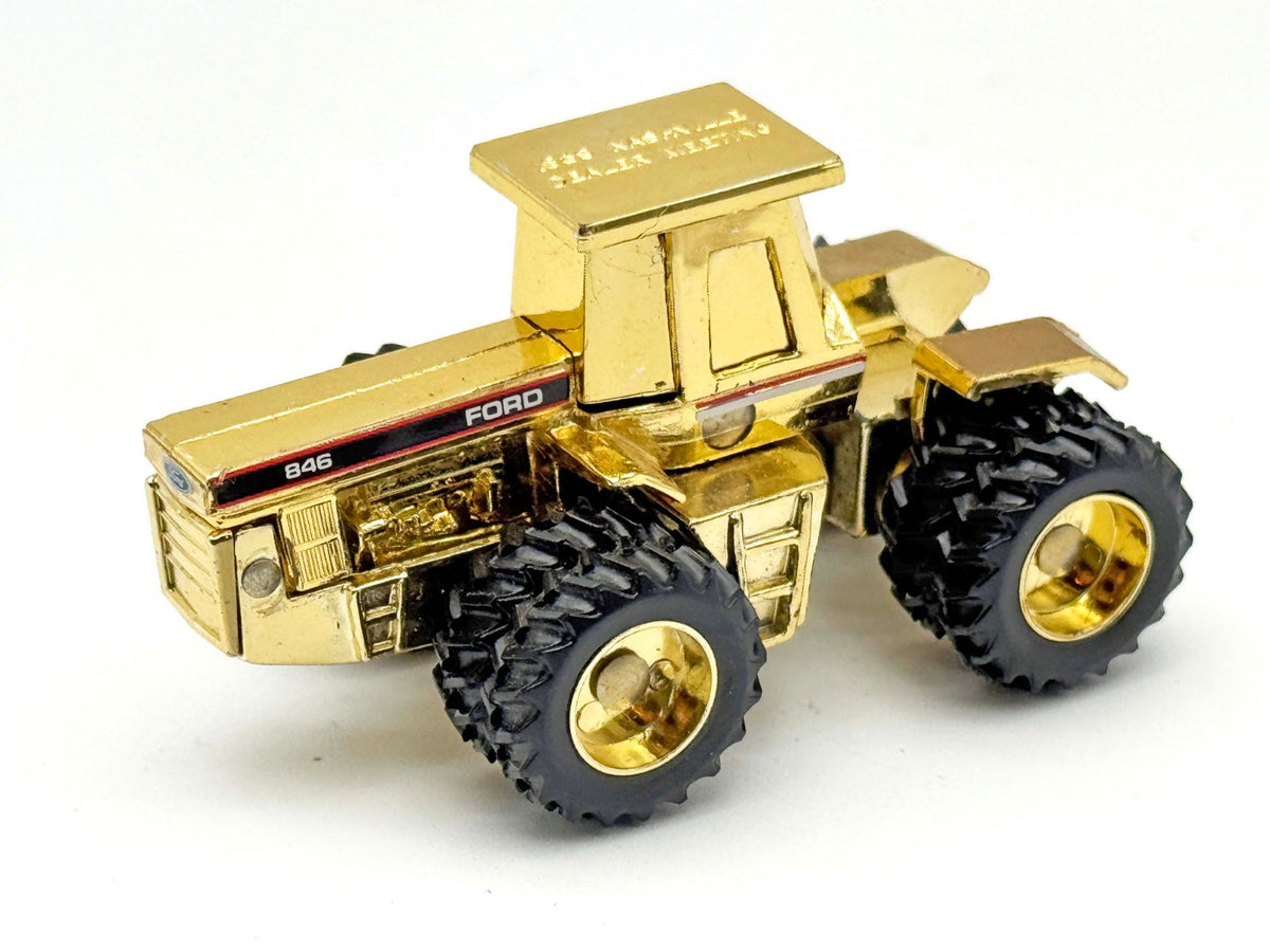 1/64 Ford 846 4WD Gold Tractor With Duals Dealer Meting